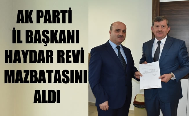 AK Parti Trabzon İl Başkanı Haydar Revi mazbatasını aldı