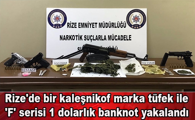 Rize'de bir kaleşnikof marka tüfek ile 'F' serisi 1 dolarlık banknot yakalandı