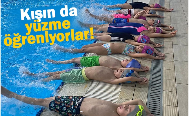 Kışın da yüzme öğreniyorlar!